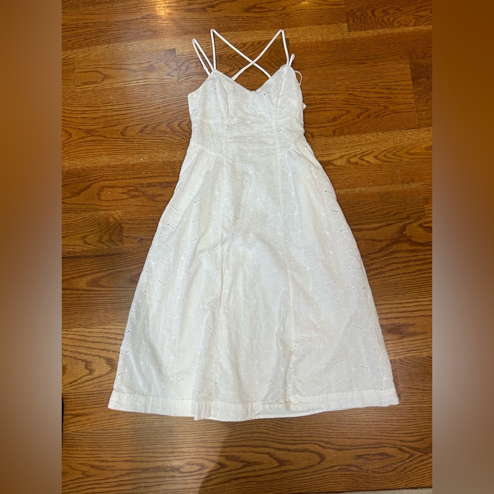 Beautiful wild fable white dress with flowers embroidered on it!